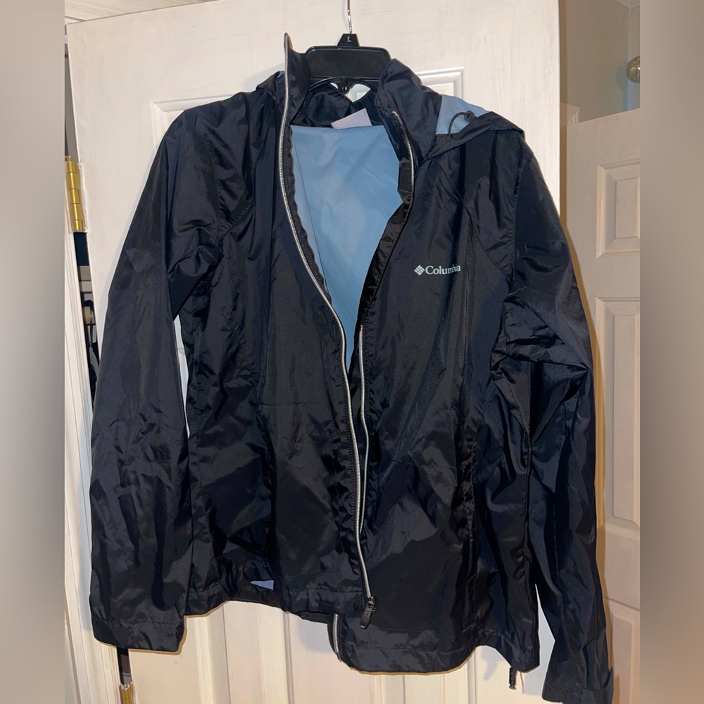 Columbia women’s black rain jacket, size large.